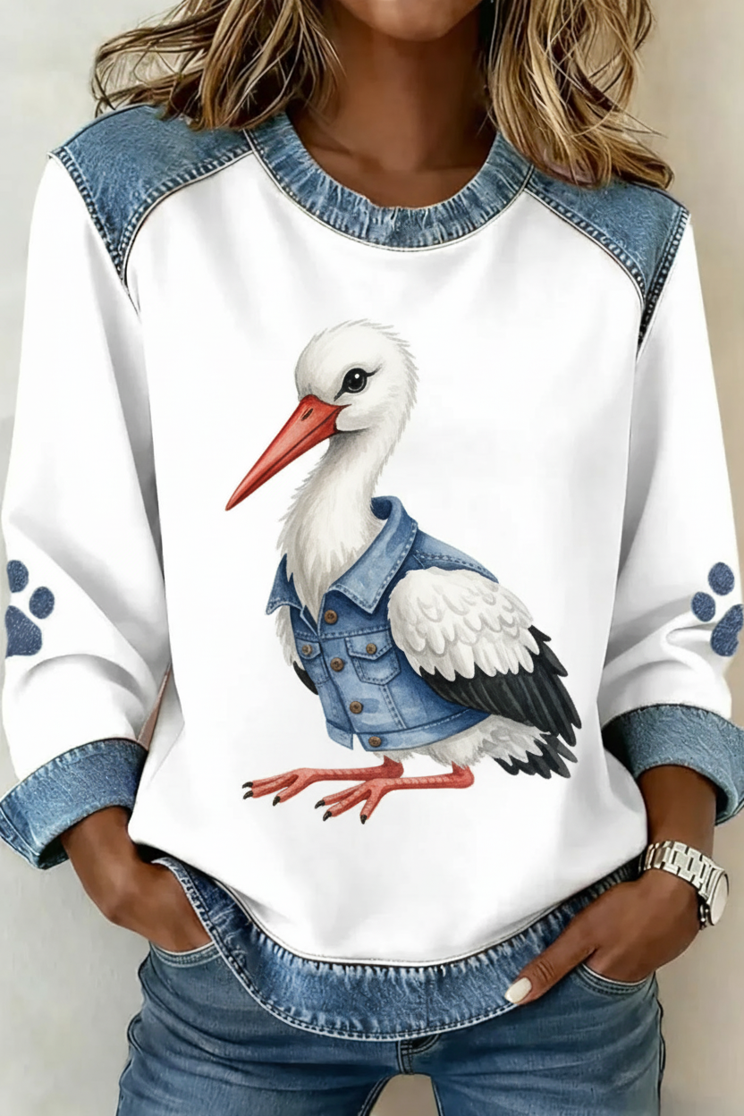 Ooievaar met denim jasje